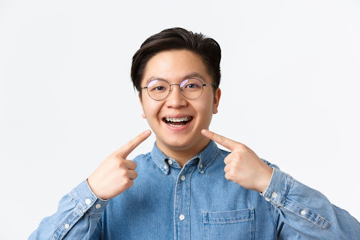 smiling with braces